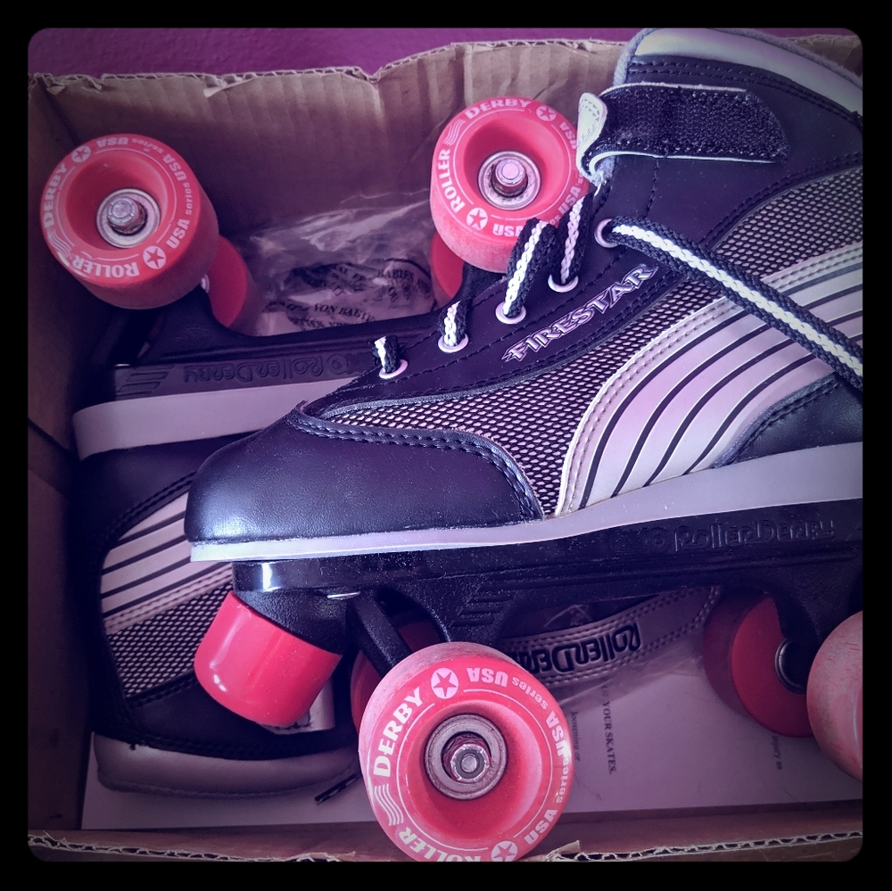 Roller derby silver and black skates